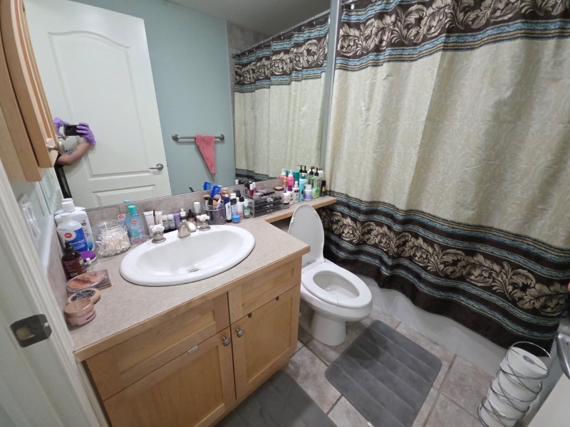 Clean and organized bathroom vanity after NeatNow first-time cleaning
