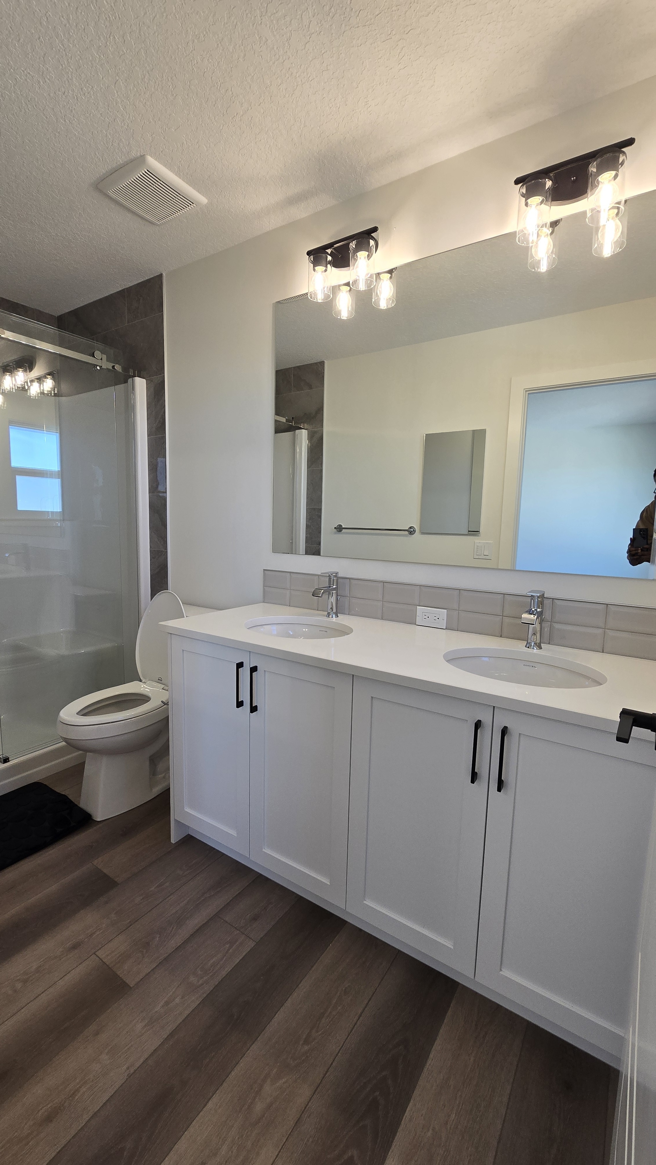 Clean double vanity bathroom after house cleaning