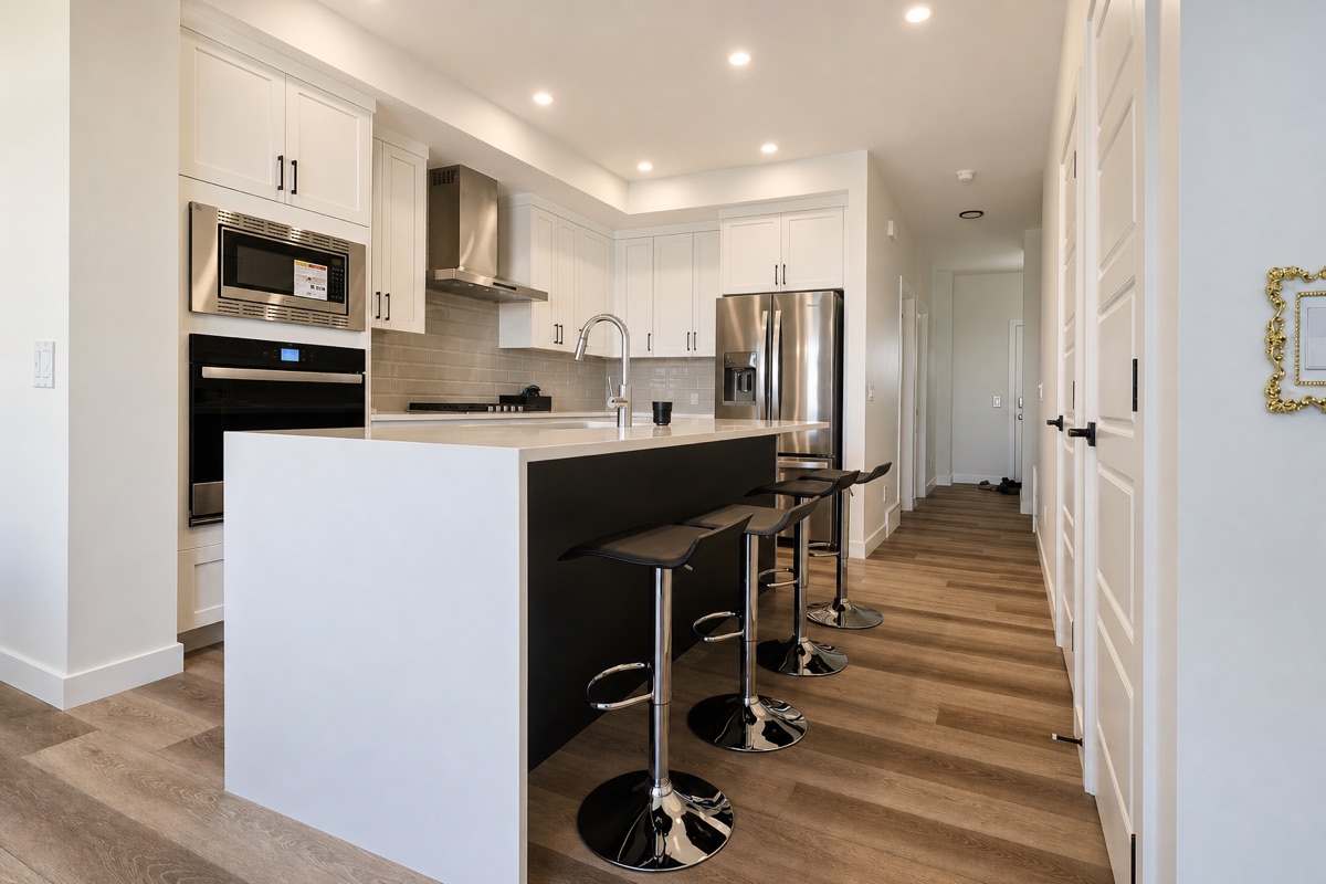 Kitchen island and cabinets after a NeatNow clean in Calgary