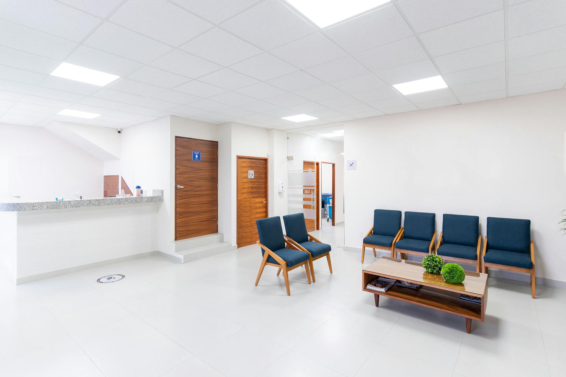 Clean, bright medical clinic waiting room with modern seating