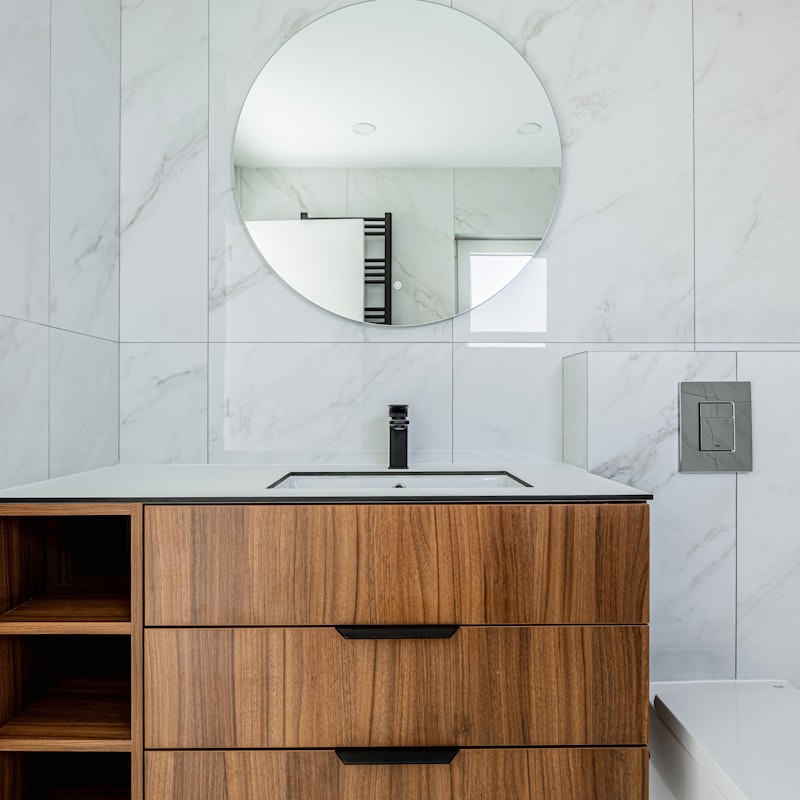 Professional cleaner deep cleaning a Calgary bathroom