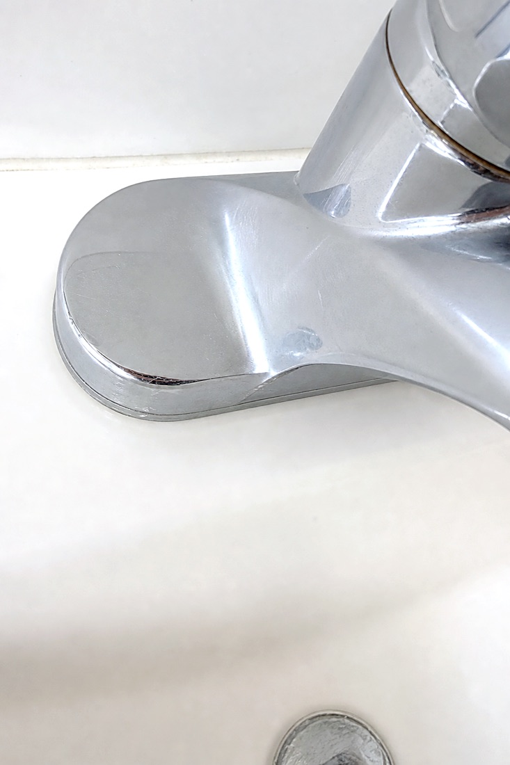 After photo of the same faucet descaled and polished to a shine, cleaned by NeatNow in Calgary